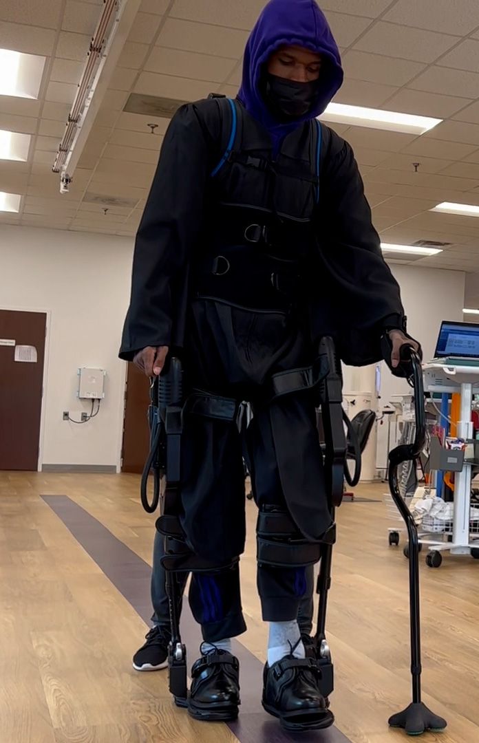 Wearable robot will help graduate walk for first time in  7years