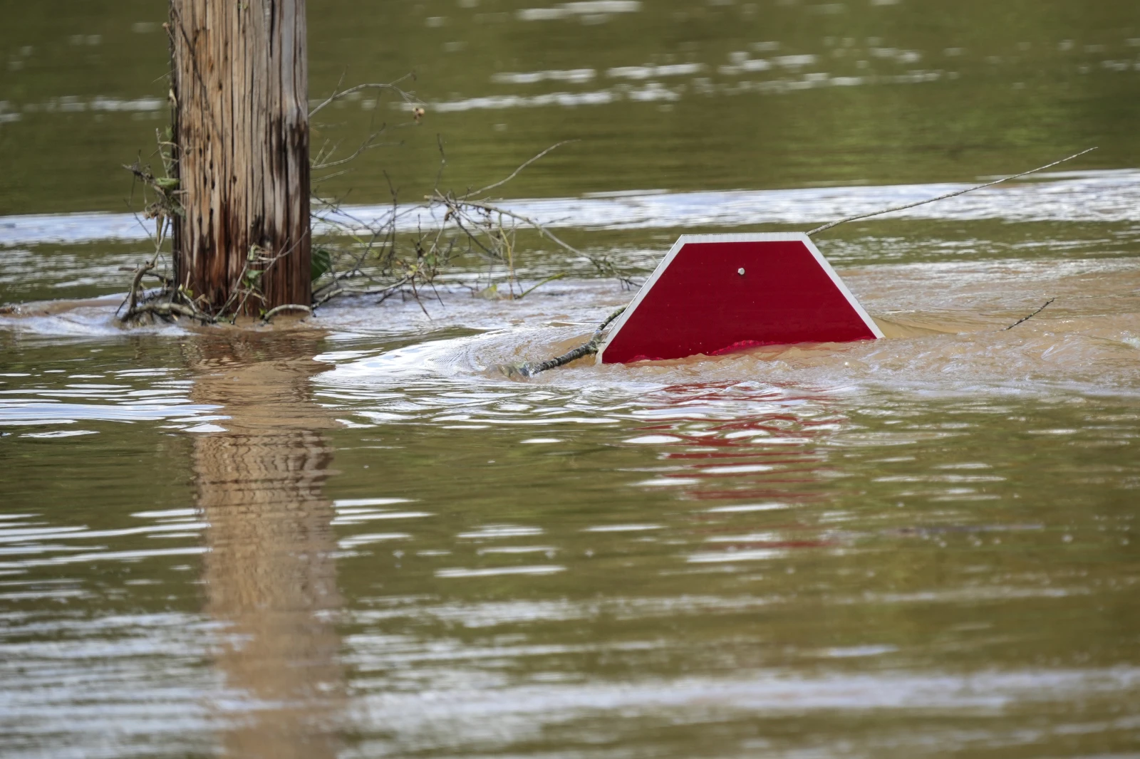 Supplies rushed to communities isolated by Helene as the death toll rises to at least 107